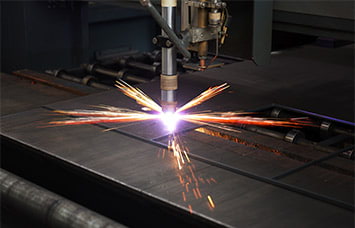 Industrial cnc plasma cutting of metal plate